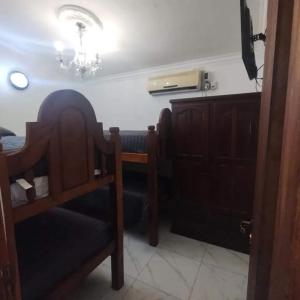 a dining room with a chair and a table at Casa CNH 2 in Santiago del Estero