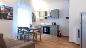 Kuchyň nebo kuchyňský kout v ubytování Orvieto Residence