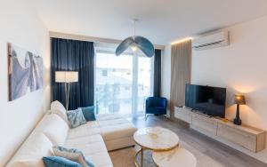 TV a/nebo společenská místnost v ubytování Sunset Resort 307