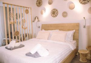 Ένα ή περισσότερα κρεβάτια σε δωμάτιο στο Zen Beach Front Suite