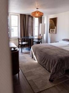 Postel nebo postele na pokoji v ubytování Le Virage bistro en hotel + 24 fotografií
