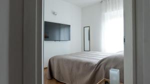 Postel nebo postele na pokoji v ubytování Orvieto Residence