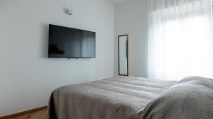 Postel nebo postele na pokoji v ubytování Orvieto Residence