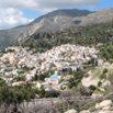 a view of a mountain with rocks and trees at Xenos Apartments in Keratokampos