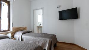 TV a/nebo společenská místnost v ubytování Orvieto Residence