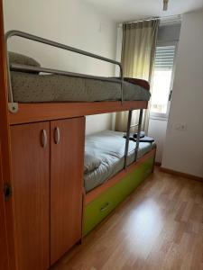 Postel nebo postele na pokoji v ubytování Apartament Vall de Barravés