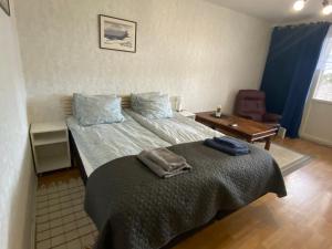 Postel nebo postele na pokoji v ubytování A&M