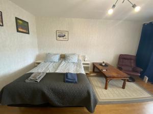 Postel nebo postele na pokoji v ubytování A&M