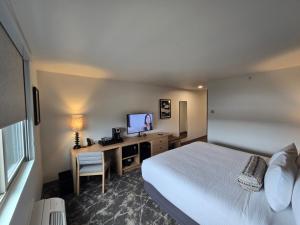 Postel nebo postele na pokoji v ubytování Rayland Hotel