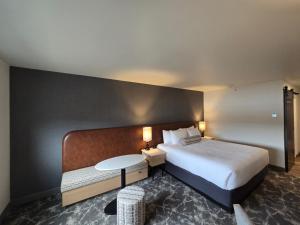 Postel nebo postele na pokoji v ubytování Rayland Hotel
