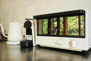 a white toaster sitting on top of a kitchen counter at Karuizawa Mori Shiki VILLA - Vacation STAY 57077v in Kutsukake