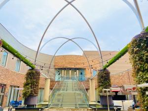a set of stairs in front of a building at Hotel Terrace the Garden Mito - Vacation STAY 75702v in Mito +3 photos