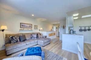 a living room with a couch and a kitchen at 217W 217 Whittley Ave in Avalon