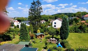 an aerial view of a house with a yard at Dachgeschoss35 in Witten