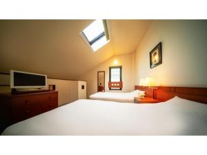 Imagen de la galería de Hotel Io Alpheratz - Vacation STAY 48104v, en Kasama