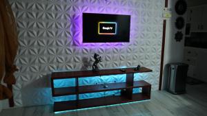 TV a/nebo společenská místnost v ubytování Pebble Coin