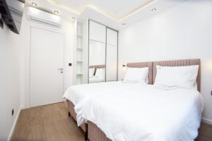 Villa Aurora Azure - Luxury Infinity Pool Resort客房内的一张或多张床位