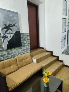 Posezení v ubytování Trina Cozy Suites