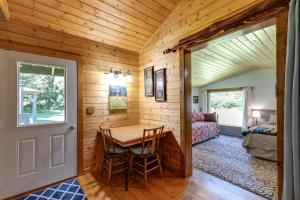 a dining room with a table in a room at Making lasting memories while enjoying this unique glamping experience in Maple Falls