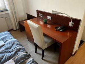 Postel nebo postele na pokoji v ubytování Hotel Tenova Köln-Neumarkt