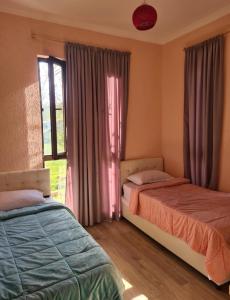 Postel nebo postele na pokoji v ubytování MAG house + 5 fotografií