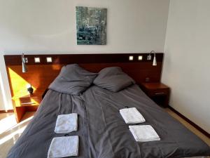 Postel nebo postele na pokoji v ubytování Hotel Tenova Köln-Neumarkt