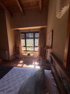 Postel nebo postele na pokoji v ubytování Hotel Guara Inlukā