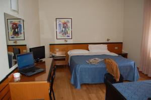 Cama o camas de una habitación en Hotel Nuova Grosseto