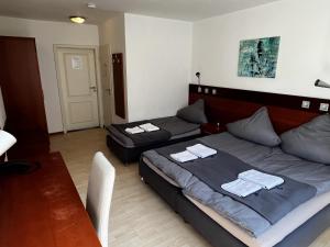 Posezení v ubytování Hotel Tenova Köln-Neumarkt