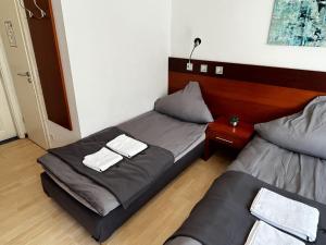 Posezení v ubytování Hotel Tenova Köln-Neumarkt