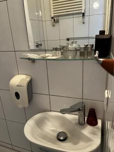 Koupelna v ubytování Hotel Tenova Köln-Neumarkt