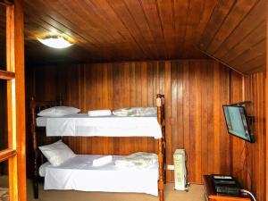 Postel nebo postele na pokoji v ubytování La Casa da Fotografia