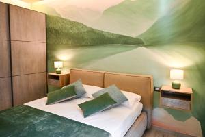 A bed or beds in a room at Solema Lake Como