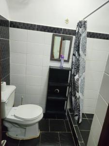 Koupelna v ubytování Trina Cozy Suites