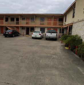 a parking lot in front of a motel at Choice Inn San Antonio in San Antonio