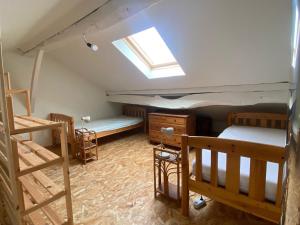 Letto o letti in una camera di Le Refuge de Libin