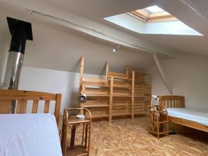 Letto o letti in una camera di Le Refuge de Libin
