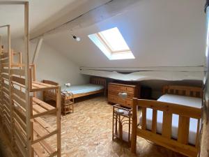 Letto o letti in una camera di Le Refuge de Libin