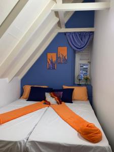 Postel nebo postele na pokoji v ubytování Trina Cozy Suites