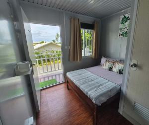 Postel nebo postele na pokoji v ubytování Olive Hostel Roxas City