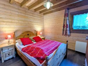 Postel nebo postele na pokoji v ubytování Chalet cosy à La Bresse avec WIFI et parking, proche pistes - FR-1-589-310
