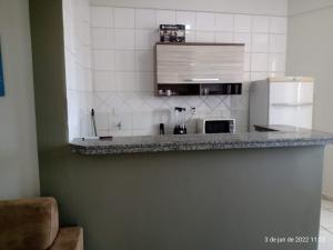Η κουζίνα ή μικρή κουζίνα στο AP 601 CENTRO Melo MONTES CLAROS PROXIMO HOSPITAL STA CASA