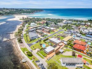 an aerial view of a town next to the ocean at Lakeside Apartments 7 in Merimbula