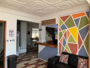 TV a/nebo společenská místnost v ubytování Hostal El Naufrago 2 + 12 fotografií