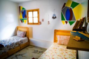 Postel nebo postele na pokoji v ubytování Jungle House imsouane