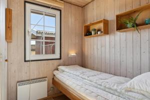 Postel nebo postele na pokoji v ubytování Feriehus 1114