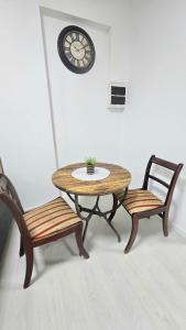 Posezení v ubytování Antionette Studio Apartment