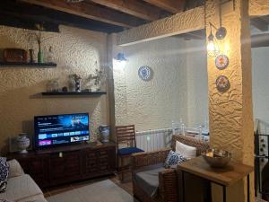A television and/or entertainment centre at Casa Artista