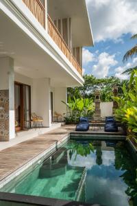 Bazén v ubytování Kemari Ubud nebo v jeho okolí