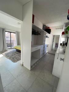 Kuchyň nebo kuchyňský kout v ubytování Casa en Residenciales Pachuca